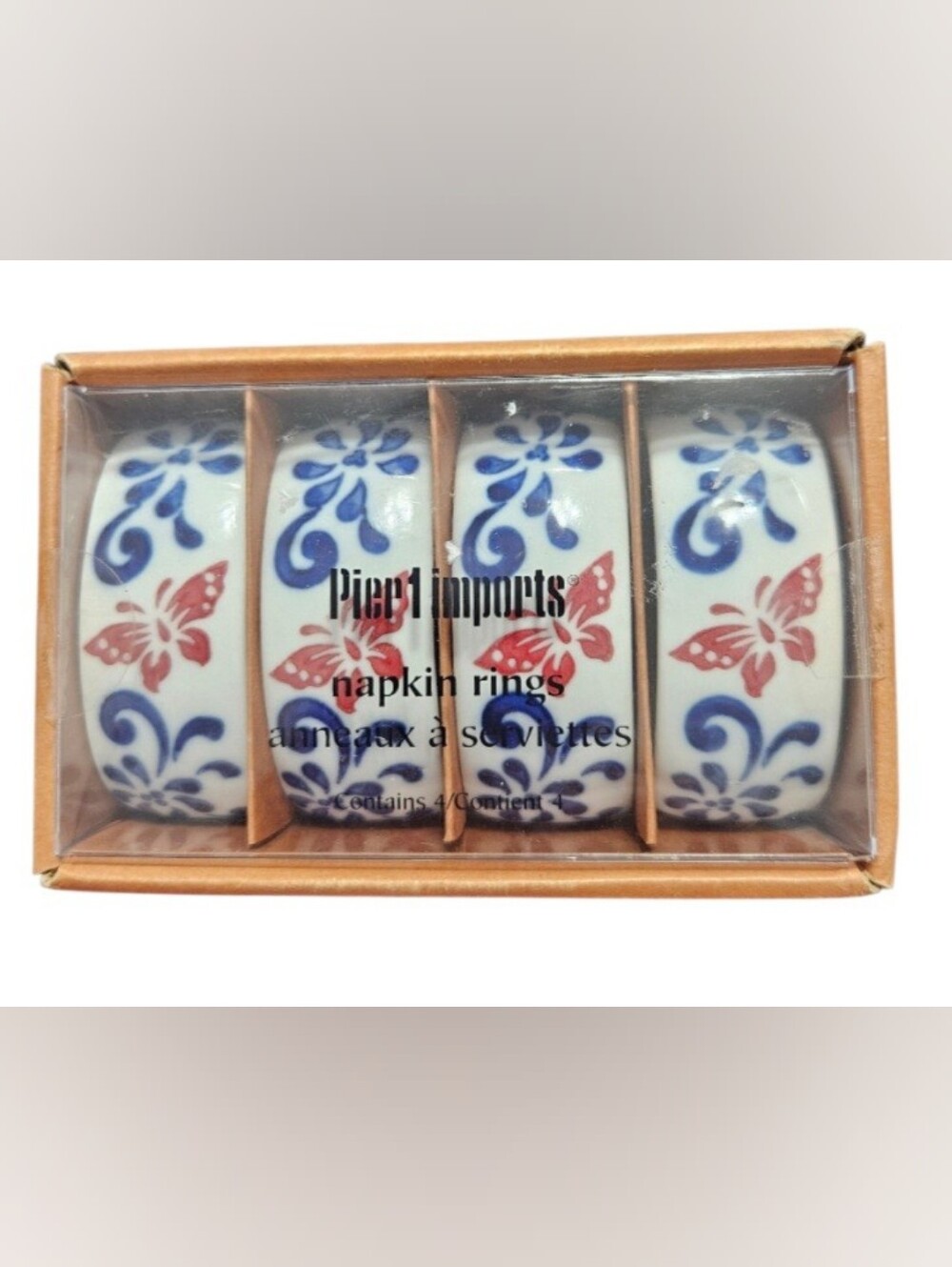 New in Box Unopened Pier 1 Imports Ceramic Napkin Rings featuring a charming red